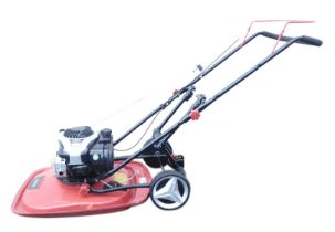 A Briggs and Stratton Cobra 575EX series petrol lawn mower, 140CC.