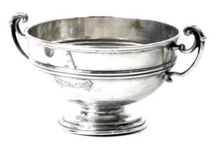 An Edward VII silver loving cup, of ribbed design bearing the initial A and inscribed 13th December