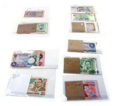 A group of world banknotes, for South Africa, the Philippines, East Africa to include Kenya, Uganda,