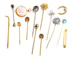 Various tie pins, some with yellow metal tops, mainly plated and silver examples, to include horse's