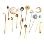 Various tie pins, some with yellow metal tops, mainly plated and silver examples, to include horse's