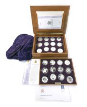 A Royal Mint The Queen's Golden Jubilee 2002 silver proof coin set, containing twenty four coins, so