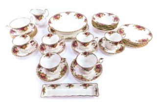 A Royal Albert Old Country Roses pattern part tea service, comprising six cups and saucers, one brea