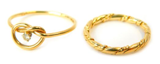 Two dress rings, comprising a hammered design wedding band, ring size I½, yellow metal stamped 375,
