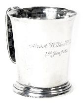 A George VI silver Christening cup, with a fluted rim on a reeded handle, inscribed Armet Wilkie Wil