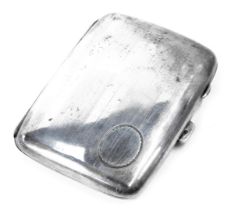 An Edward VII silver cigarette case, with engine engraved striped design and an oval cartouche, Birm