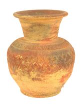 A large terracotta vase, of globular form with flared neck, decorated with bands of abstract pattern