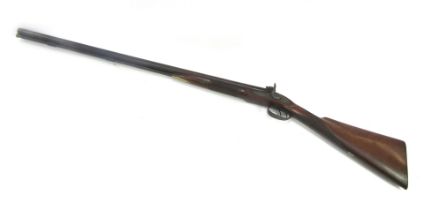 A 19thC hammer action twin barrel sporting gun, for CJ Thomsett, muzzle loading, with wooden ramrod,