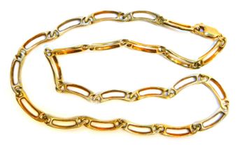 A fancy link neck chain, arched form with pierced central design, yellow metal stamped 375, 42cm lon