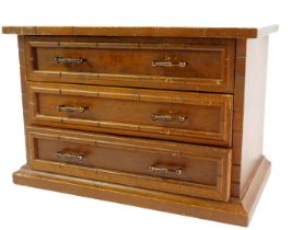 A Victorian oak apprentice chest, of three long drawers, raised on a plinth base, 19cm high, 29cm wi