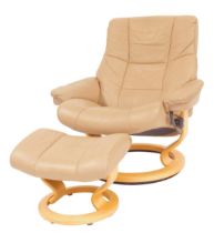 A Stressless reclining armchair, in taupe leather upholstery, on a beech circular base, together wit