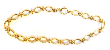 A fancy link bracelet, with oval links with joined cross section links, yellow metal stamped 375, 20