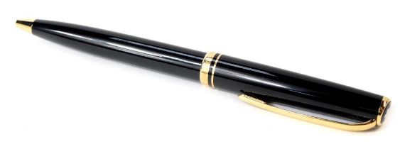 A Mont Blanc presentation biro, in black casing with gold rim, in fitted case.