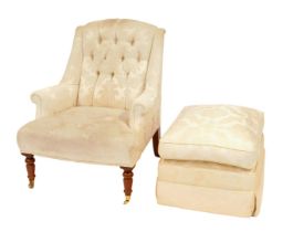A 20thC armchair, upholstered in cream foliate design fabric with a buttoned back, scroll arms, rais