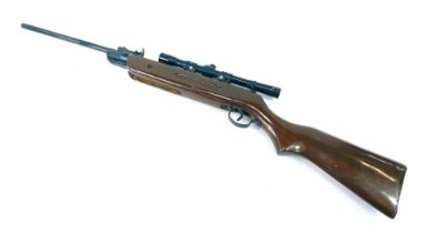 A Westlake .22 calibre air rifle, with Nikko Stirling 4x20 sight, on a brown stock, 96cm long.