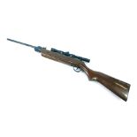 A Westlake .22 calibre air rifle, with Nikko Stirling 4x20 sight, on a brown stock, 96cm long.