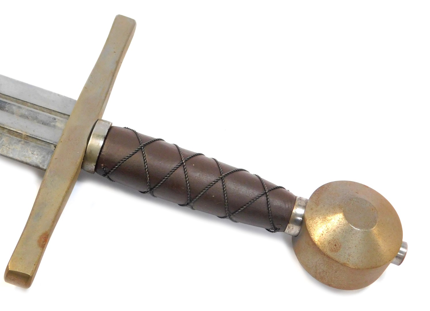 A replica medieval broad sword, with circular pommel, brown leather grip with twisted wirework cross