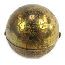 A mid century Pygmalion powder compact, modelled as a globe, the hinged lid with mirror inset to top