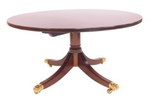 A 20thC mahogany coffee table by Deryck Gilham of Long Sutton Lincolnshire, the circular top with bo