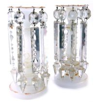 A pair of late 19thC Victorian milk glass lustres, each on a white ground with gilded decoration and