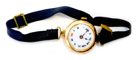 A 9ct gold cased 1960s wristwatch, with a white enamel Roman numeric watch head, and blue hands, wit