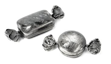 Two white metal pill boxes, each formed as a sweet, each stamped 925, 5cm wide, 0.77oz.
