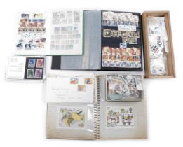 Philately. A collection of George V, George VI, QEII, World and UK postage stamps, enclosed in two