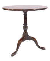 A 19thC tilt top table, the circular top on a turned column raised on cabriole legs on pad feet, 69c