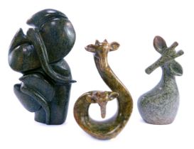 A hardstone figure group depicting mother and baby elephant, by Mike Muza, 21cm high, and a similar