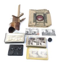 A stereoscopic viewer, together with various slides, to include Naval Gun Landed at Walfisch Bay, Ou