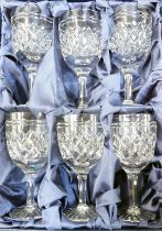 A cased set of six Tudor crystal wine glasses, 16cm high, in fitted case.