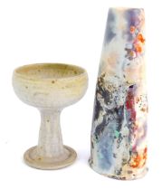 Studio pottery, comprising a grey mottled finish goblet, 14.5cm high, and a cylindrical vase, with m