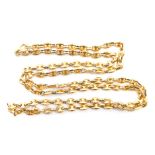 A 9ct gold fancy link necklace, the oval pierced design links with a bolt clasp, 68cm long, 29g.