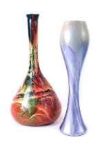 Two Art Glass vases, with mouth blown silvered and purple finish stem vase, 40cm high, an orange and