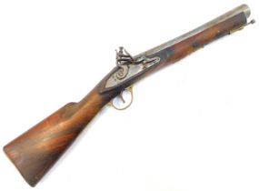 A flintlock blunderbuss, with steel barrel, indistinctly stamped, steel ramrod with brass mounts, el