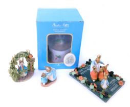 A Border Fine Arts Beatrix Potter Classics Peter Rabbit Water Ball, boxed, together with a World of