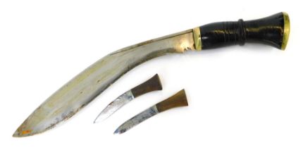 A Nepalese or Indian Kukri, with painted wooden handle, curved steel blade, together with the two Ka