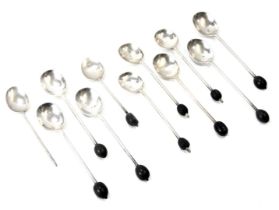 Eleven Edward VII and later silver coffee bean spoons, various dates, 2.81oz gross.
