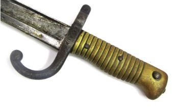 An 1866 pattern French Chassepot sword bayonet, with brass grip, and black painted metal scabbard, n