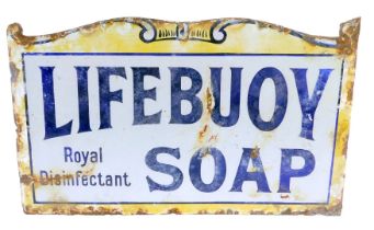 An early 20thC Lifebuoy Soap enamel advertising sign, with wall mounted section, on a white and yell