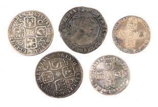 A group of silver coinage, comprising a George III silver Shilling 1723, another similar, possibly 1
