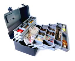 Fishing tackle, comprising a fisherman's toolbox, with various spools, lines, floats, weights, etc.