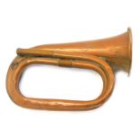 A Besson and Co London copper bugle, dated 1940, 24.5cm long.