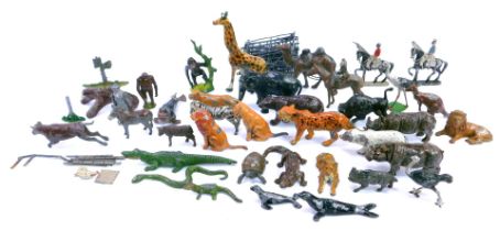 A group of early 20thC zoo animals, including a tiger, giraffe, camel, bear, zebra, etc. (1 tray)