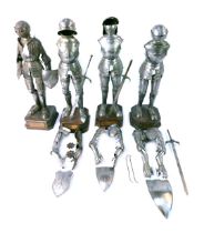 Four metal replicas of coats of armour, on oak bases with title plates, comprising Renaissance model