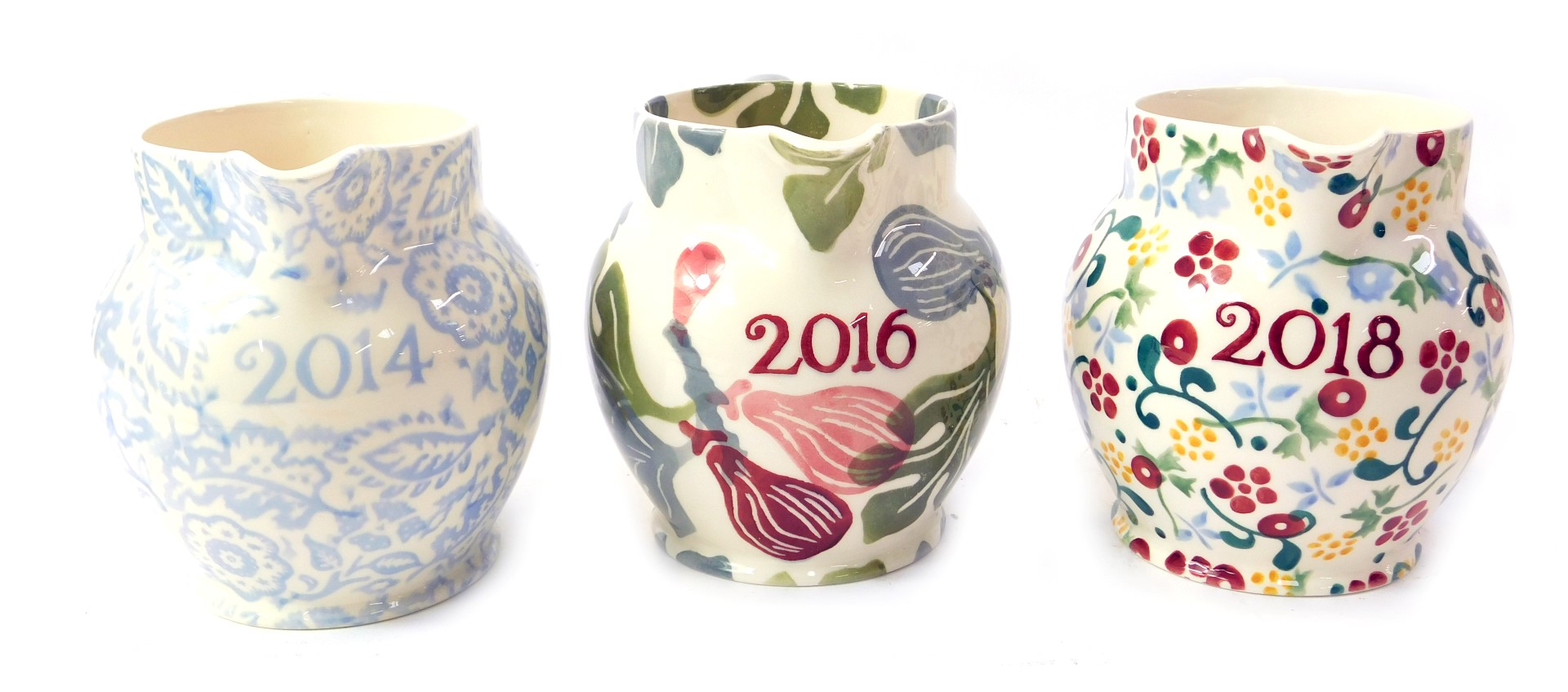 Three Emma Bridgewater pottery year jugs, for 2016, 2018 and 2014, 14cm high.