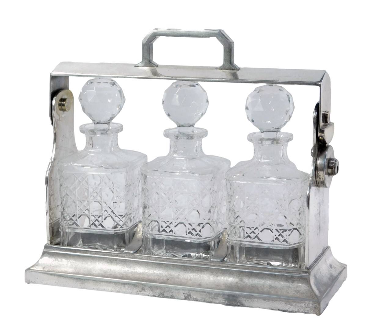 A 20thC silver plated Tantalus, with three cut glass decanters and stoppers, the stand is stamped