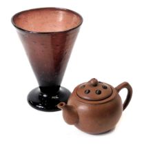 Two ceramics, comprising a 19thC soda glass drinking vessel, 12cm high, and a brown treacle glazed