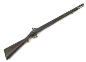 A 19thC percussion musket, with steel ramrod, brass trigger guard and furniture, wooden stock, with