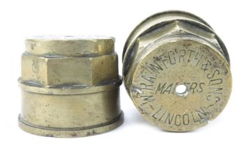 A pair of W Rainforth & Sons Lincoln cart hub caps, 9cm diameter.